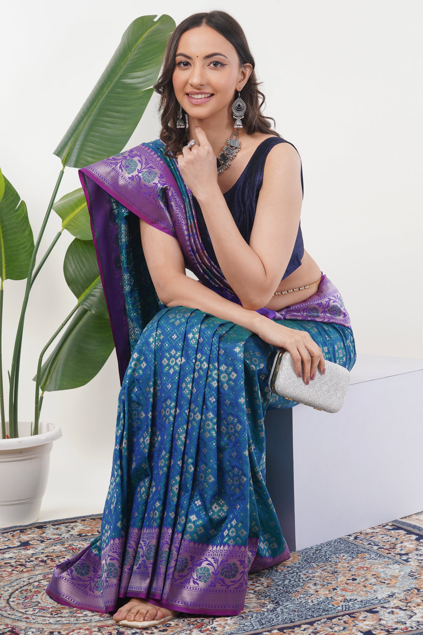 Teal Blue Handwoven Pure Banarasi Silk Saree with Purple Border – Geometric Floral Zari Weave