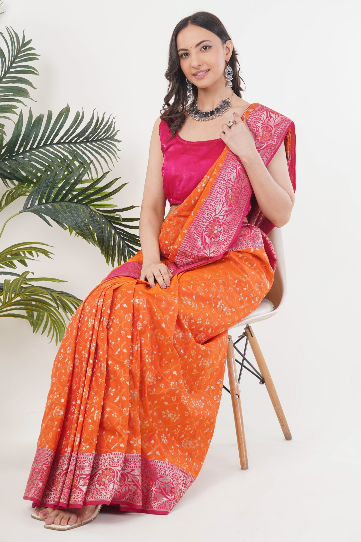 Coral Orange Handwoven Pure Banarasi Silk Saree with Pink Border – Floral Vine Zari Motifs